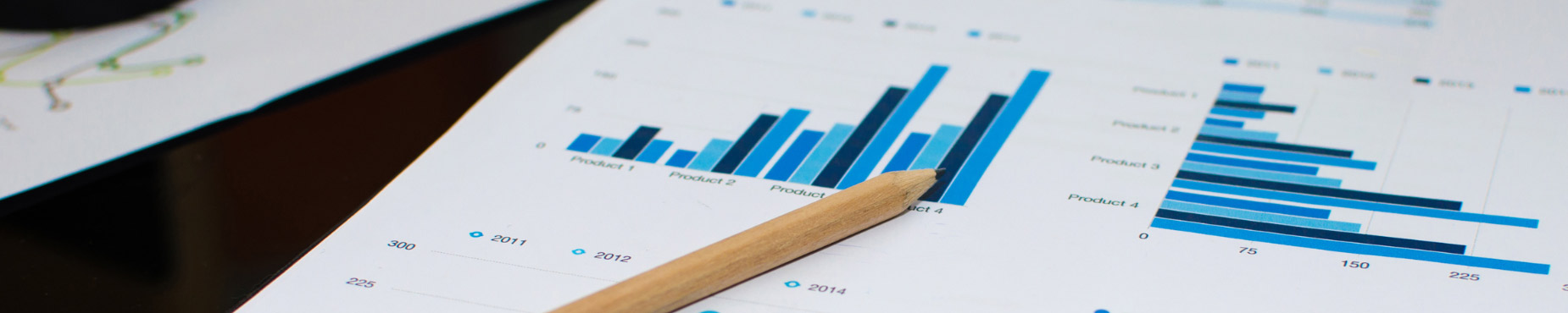 Desk with clipboard with graphs