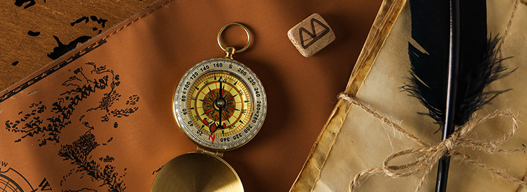 Old map. compass, and quill